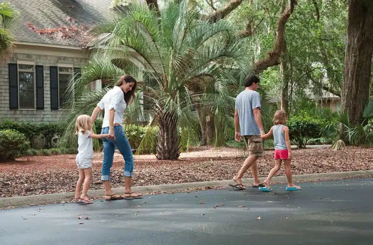 Family enjoying time outdoors near their Melbourne, Florida home after professional gnat and no-see-um control service.