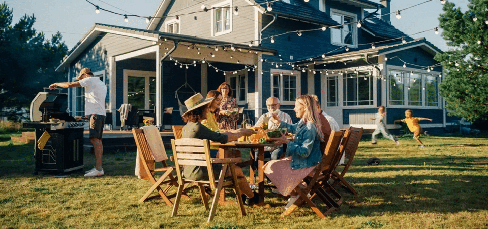 Family enjoying bite-free meal outside due to Mosquito Joe exterminator services