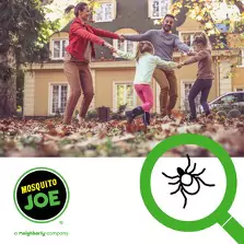 A family is enjoying the fall leaves in their backyard, but a magnifying glass reveals that ticks are lurking nearby