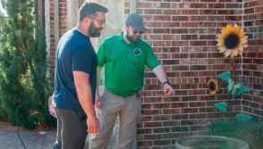 Mosquito Joe service professional conducting property inspection