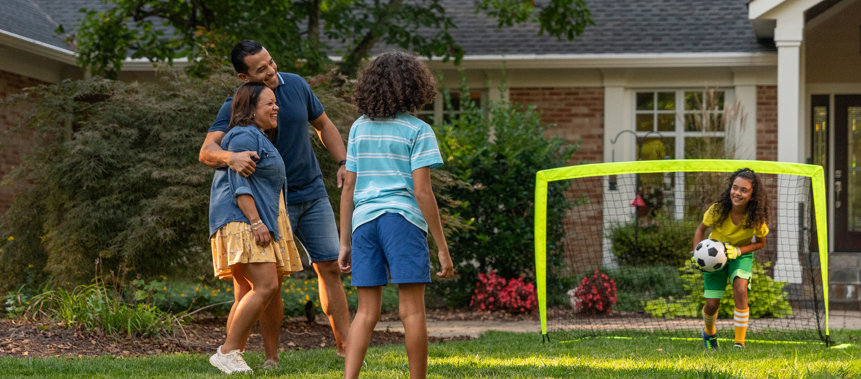 Family playing together in the backyard
