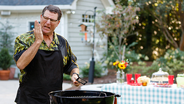 Man bbq in yard