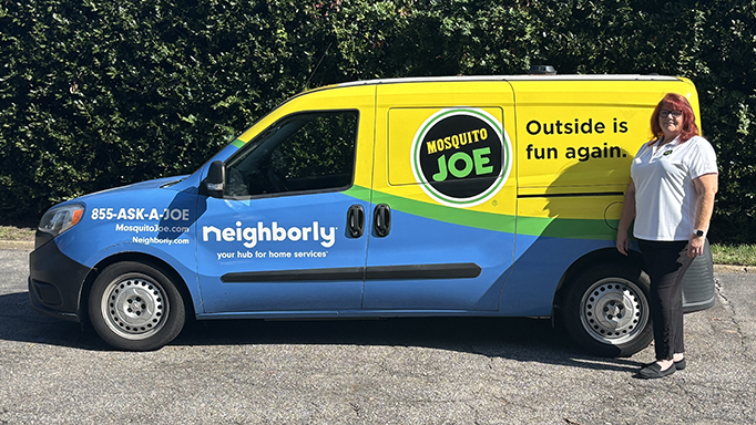 Shannon Harlow-Ellis in front of Mosquito Joe truck.