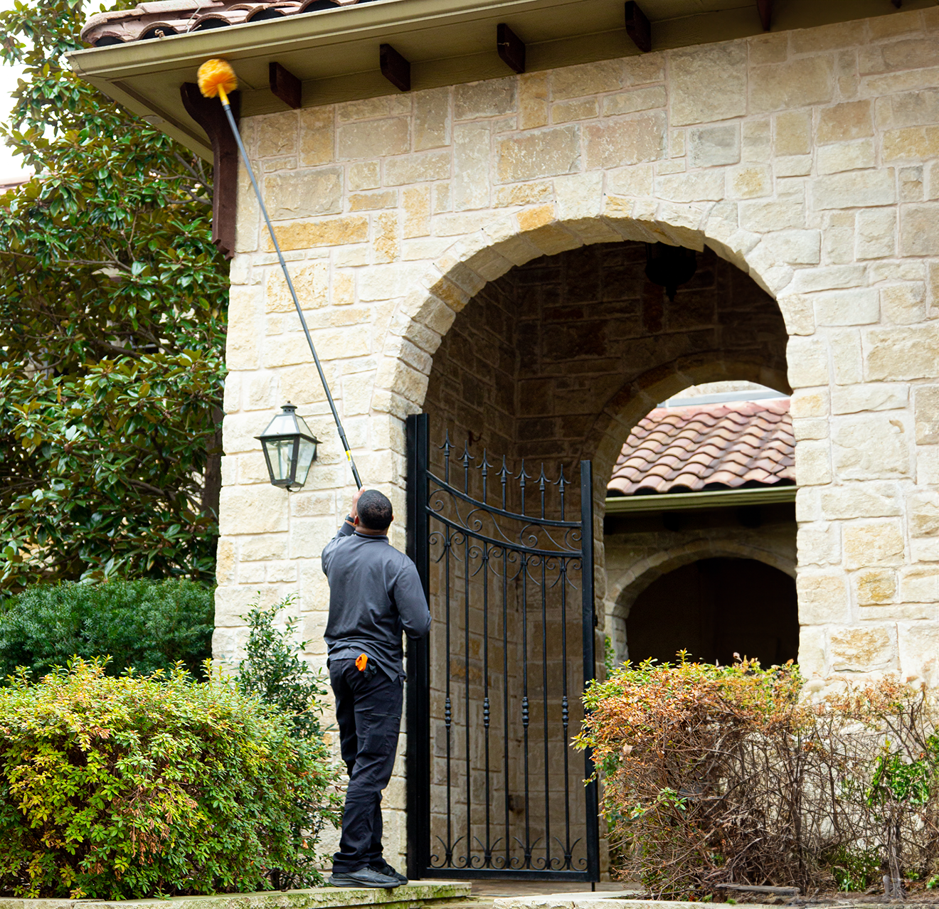 Mosquito Joe professional sweeping roof.