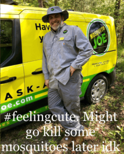 Mosquito Joe of NW Houston Technician standing in front of yellow Mosquito Joe van. 