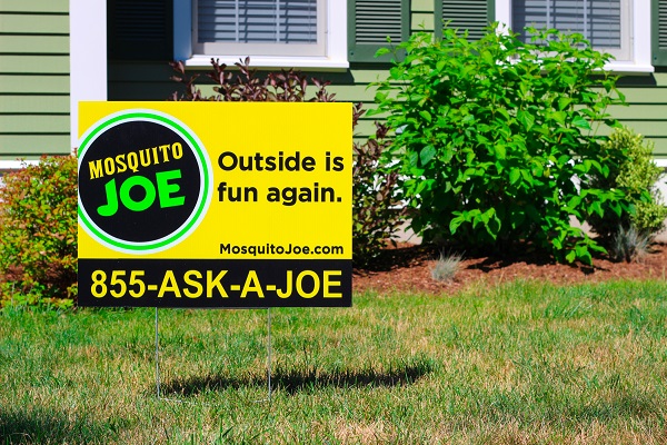 Mosquito Joe yard sign placed in front of a house