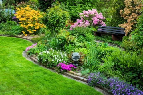 Beautiful bright garden in backyard